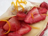 crepes filled with strawberry rhubarb sauce