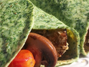 eggplant, tomatoes and mushrooms in a spinach crepe