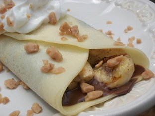 grilled bananas with nutella in a crepe
