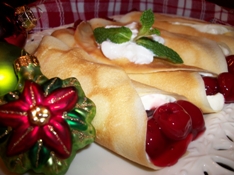 crepes filled with cream cheese and cherries