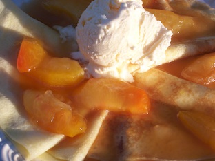 brandied plums over crepes