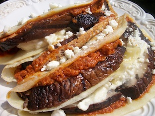 grilled portobello mushrooms, pesto and feta cheese in crepes